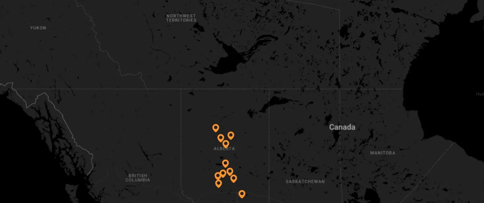 Map of Alberta showing Home Depot store locations in the Calgary and Edmonton regions where Polaron Solar specialists provide certified residential solar panel installation services.