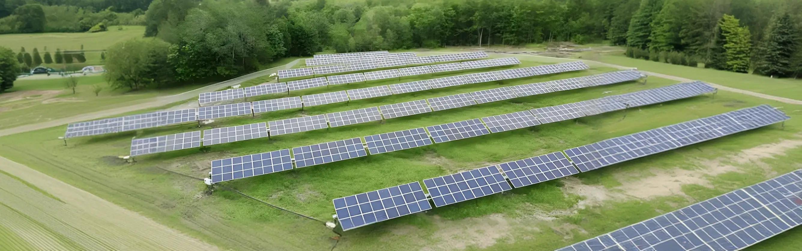 Aerial view of an Ontario home with a high-performance residential solar and battery system, featuring sleek black panels and $14,000 in available rebates.